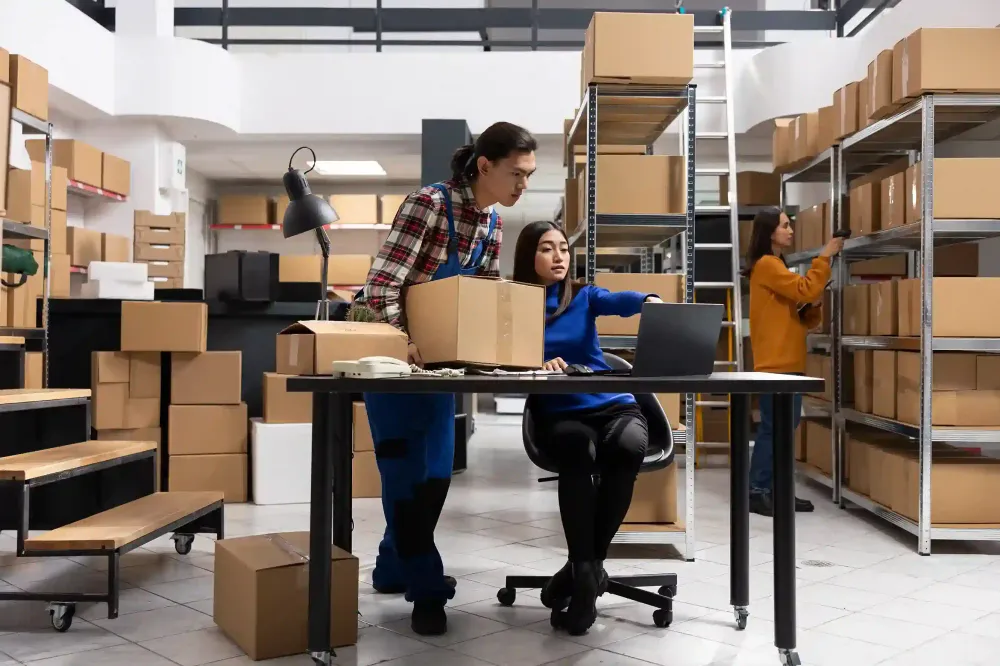 Warehouse team managing inventory and online orders using ai services for retail operations.