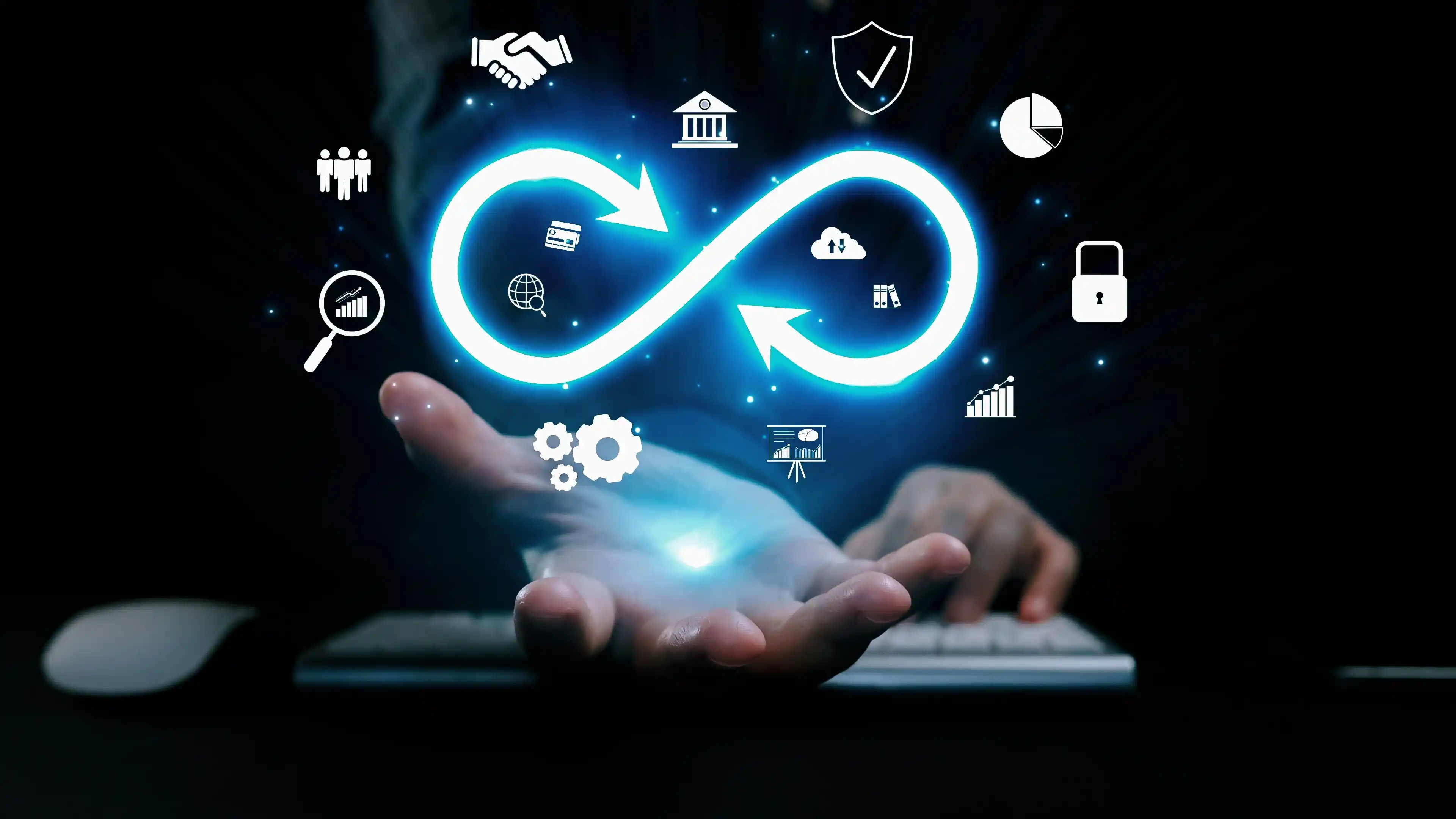 Glowing infinity loop with technology icons above a hand, symbolizing continuous integration and automation in DevOps services.
